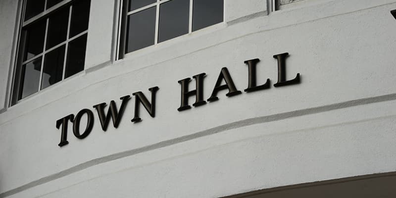 The outside of a town hall building.