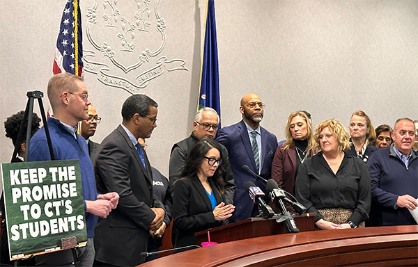 Legislative and education leaders stand during a press conference at the Connecticut Capitol supporting student-centered funding.