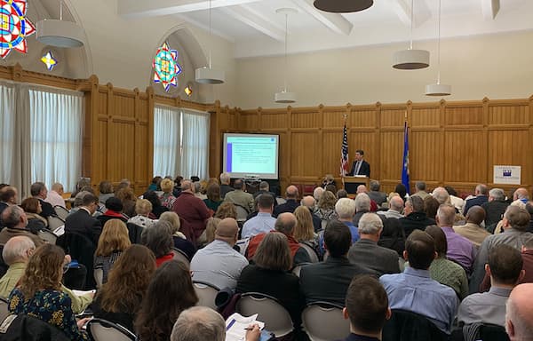 A packed crowd listens to a presentation at the Connecticut Capitol during the first Connecticut Pension Academy.